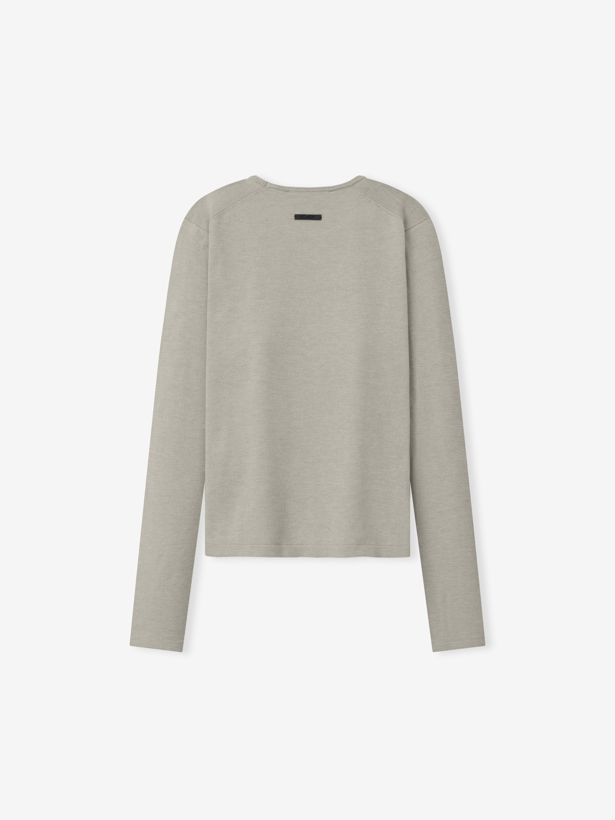 Womens Soft Knit Slim Longsleeve in a soft neutral shade, crafted from finely knit fabric with a tailored slim fit and a minimalistic design for versatile casual tops.