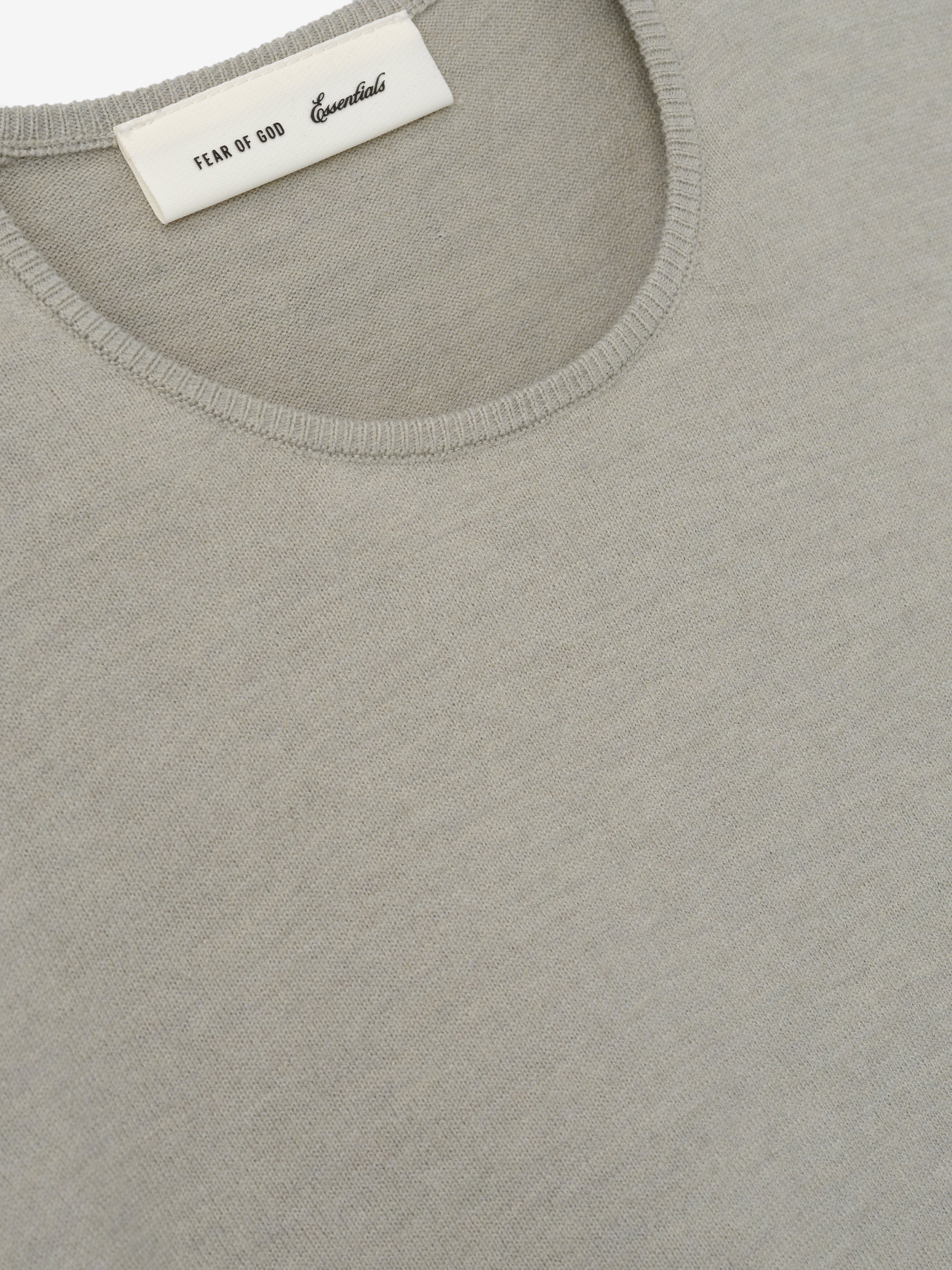 Womens Soft Knit Slim Longsleeve in a muted beige tone, crafted from fine knit fabric with a smooth round neckline and tailored slim fit for a versatile, sleek casual top.