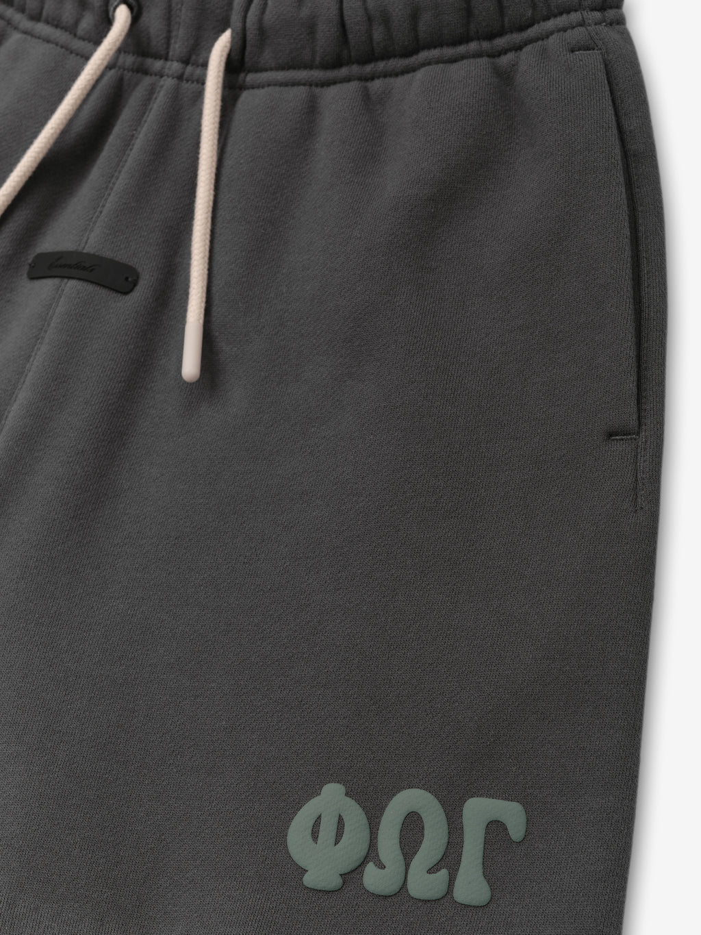 Kids Classic Sweatshort in a deep iron grey shade, featuring a comfortable elastic waistband with contrasting drawstrings and embossed branding detail for casual kids bottoms.