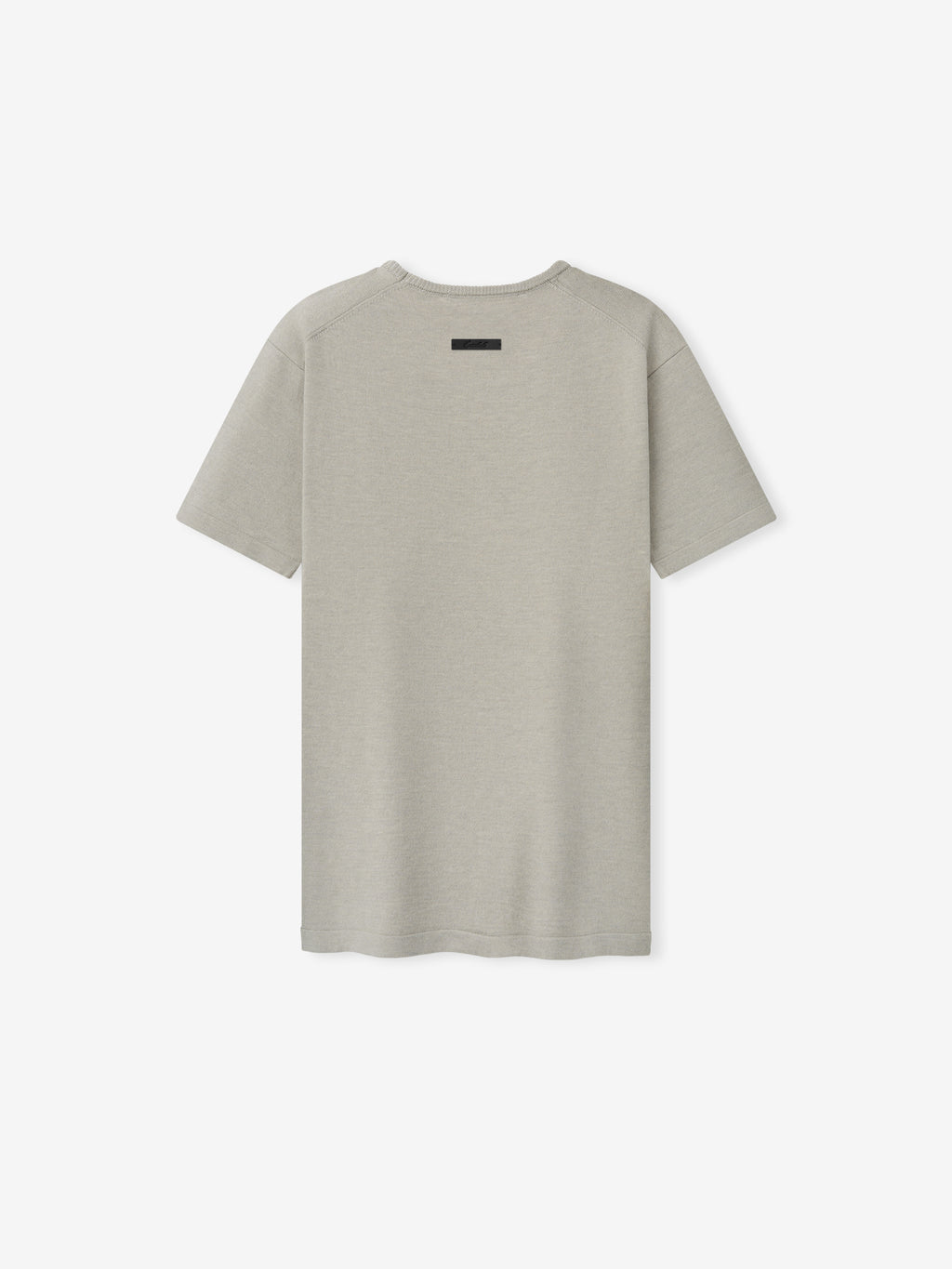 Womens Soft Knit Slim Classic Tee in a soft neutral shade, featuring a smooth knit fabric with a slim fit and a subtle branded detail at the upper back, designed for everyday casual tops.