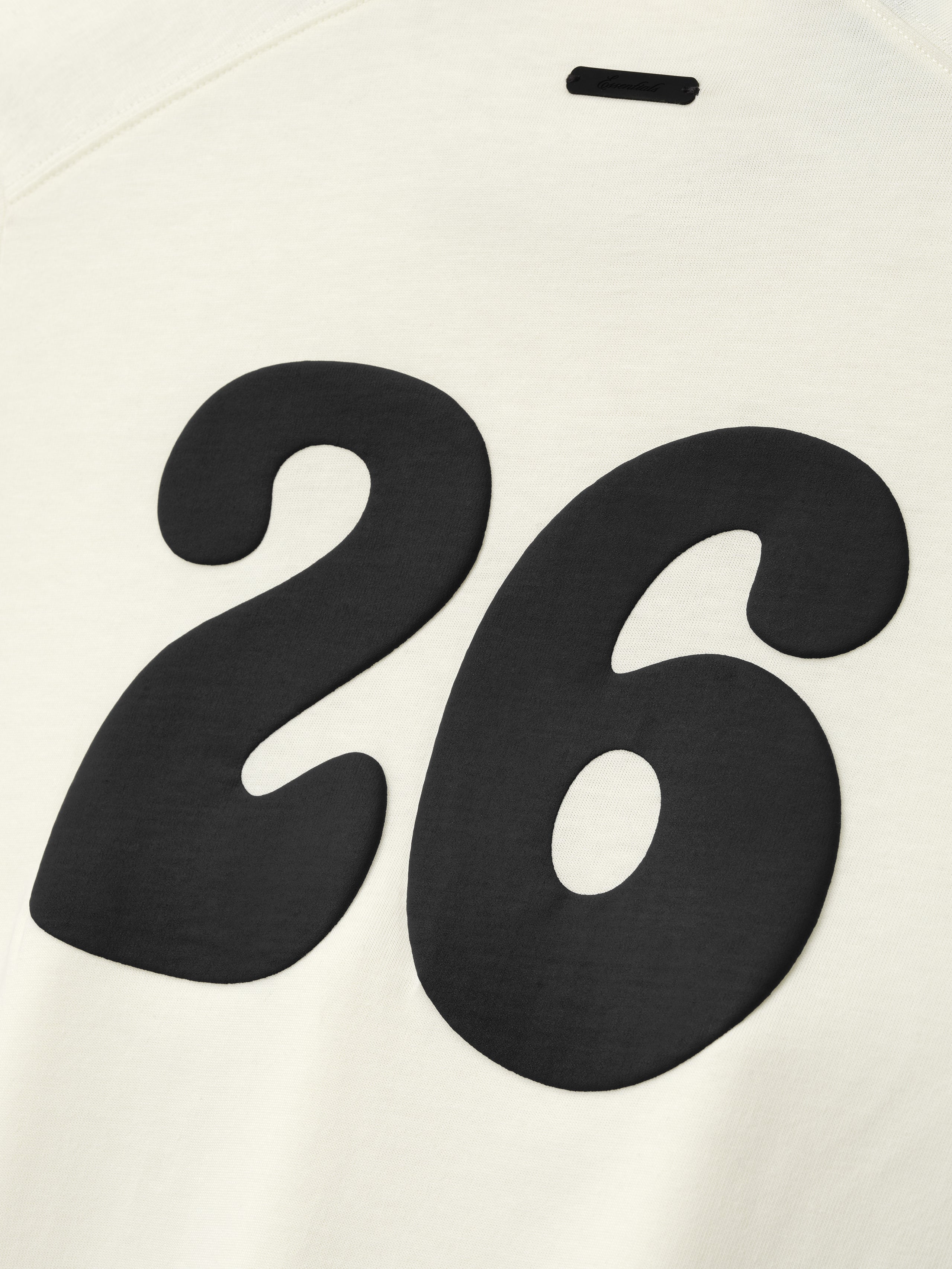 Womens Tri-Blend Classic Fit Long Sleeve Tee in soft ivory fabric featuring a large bold black number 26 graphic for a sporty, casual top layer.