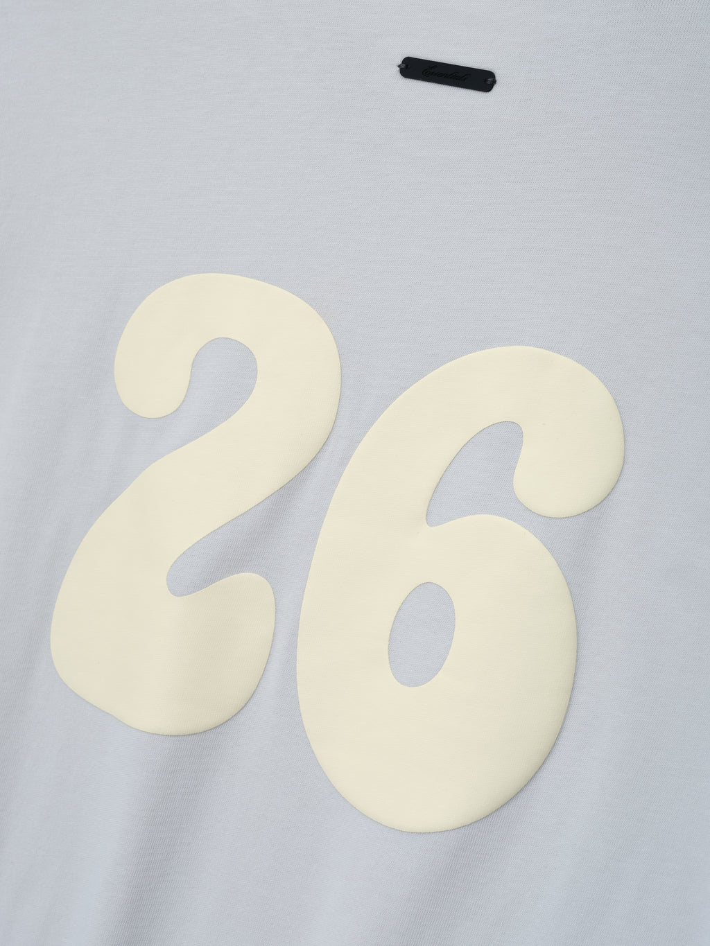Womens Tri-Blend Classic Fit Tee in a soft overcast gray shade featuring a large cream-colored number 26 on smooth fabric, highlighting a relaxed fit for casual tops.