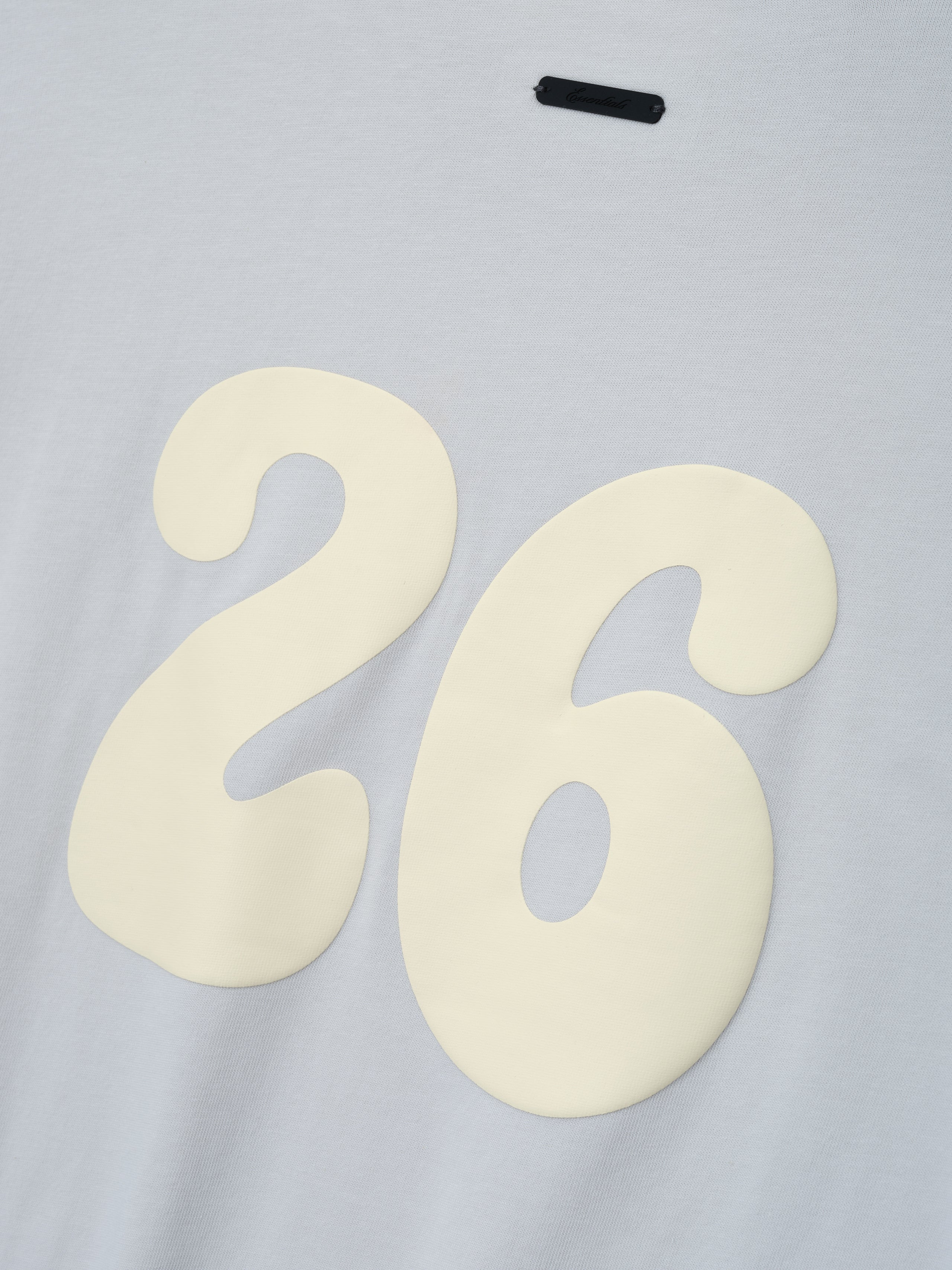 Womens Tri-Blend Classic Fit Tee in a soft overcast gray shade featuring a large cream-colored number 26 on smooth fabric, highlighting a relaxed fit for casual tops.