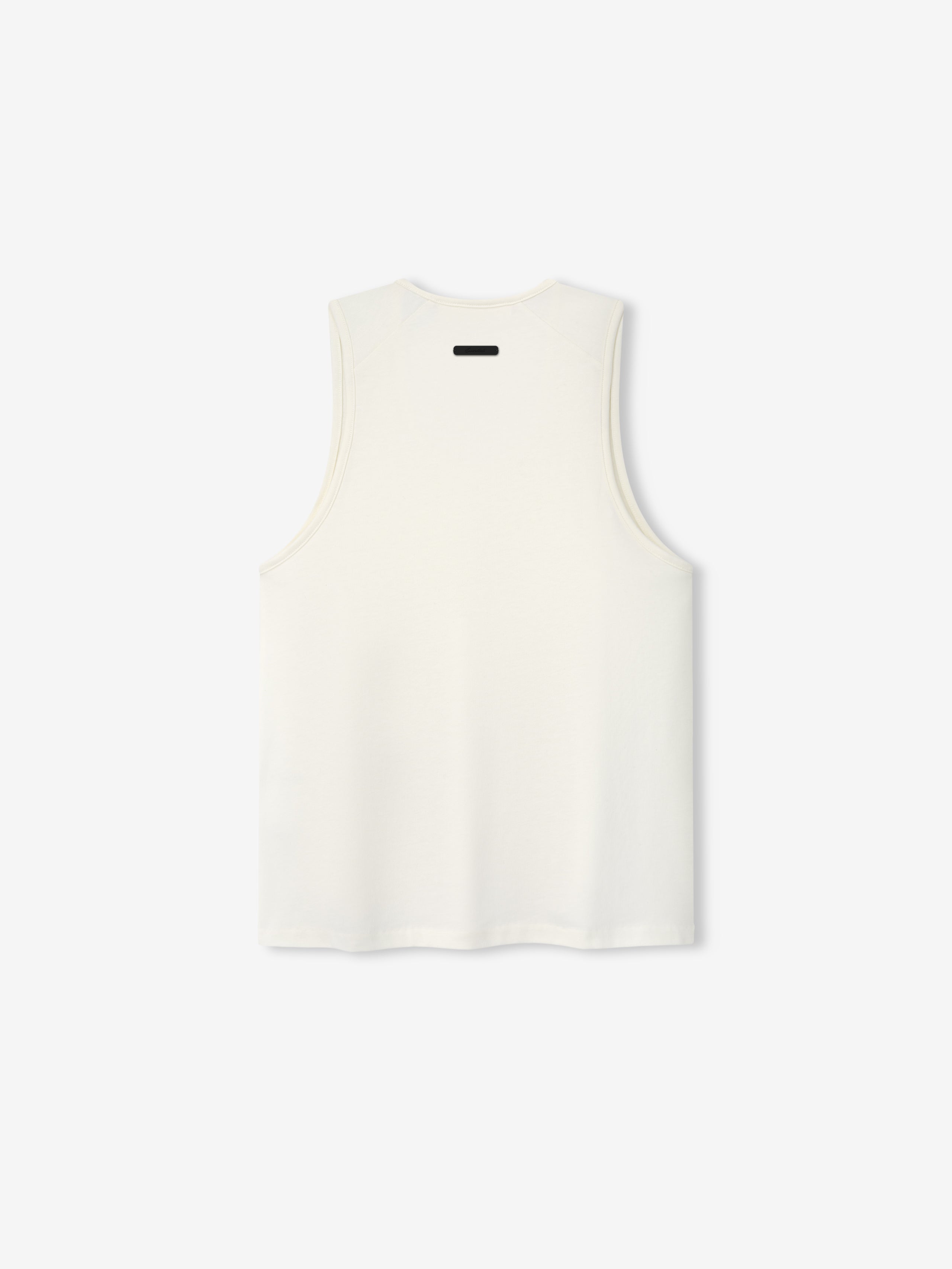 Womens Tri-Blend Classic Tank in a soft ivory tone, featuring a clean back design with a subtle contrasting tag detail for a minimalist, versatile casual top.