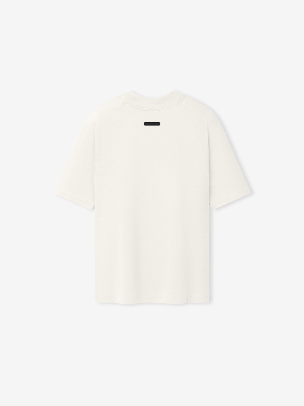 Womens Tri-Blend Shrunken Baseball Tee in a soft ivory hue showcasing a relaxed silhouette with short sleeves and a minimalist design, ideal as a casual top.
