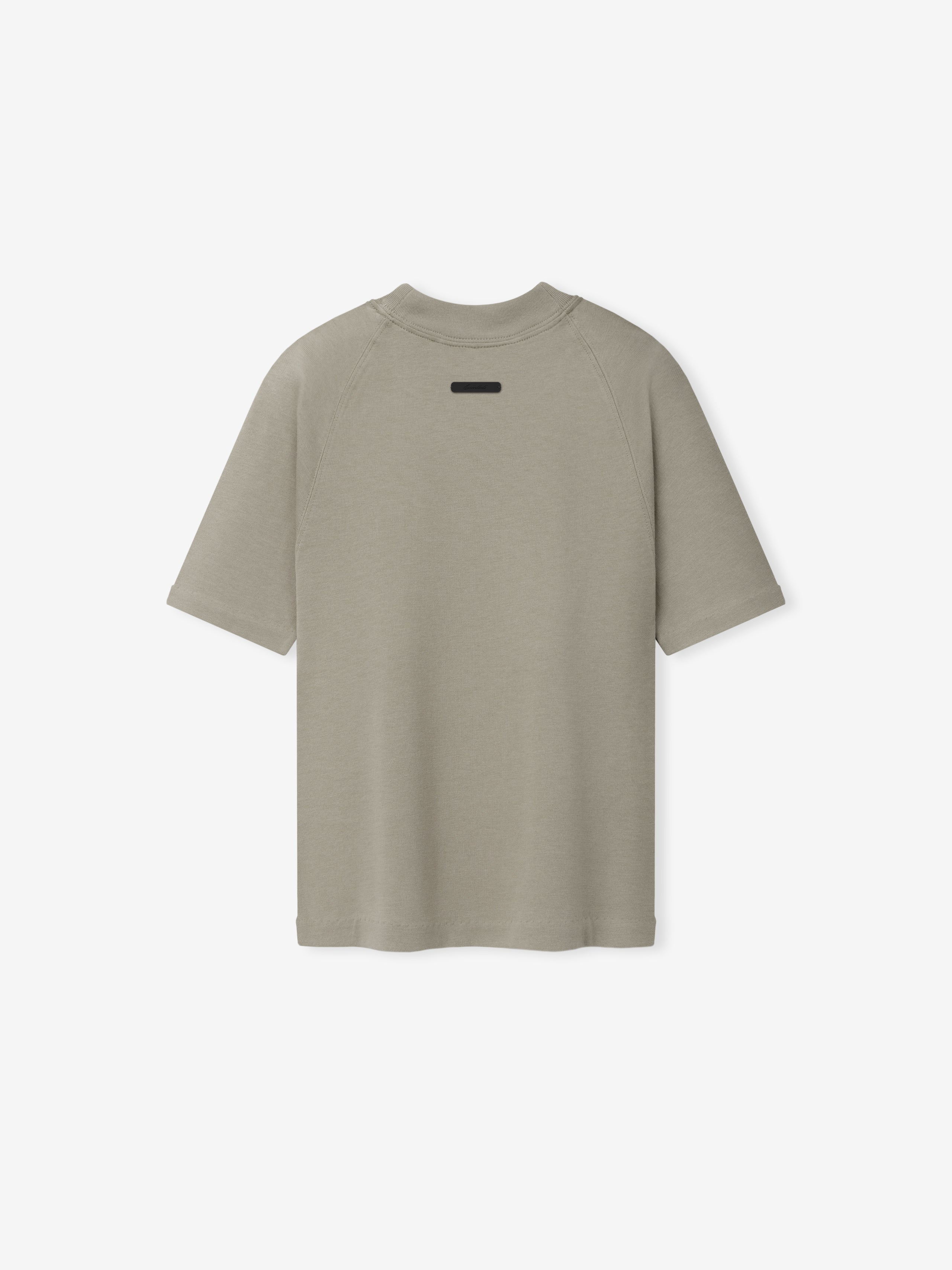 Womens Shrunken Baseball Tee in a muted sage tone featuring a relaxed fit with short sleeves and a subtle rectangular patch at the upper back, designed as a casual top.
