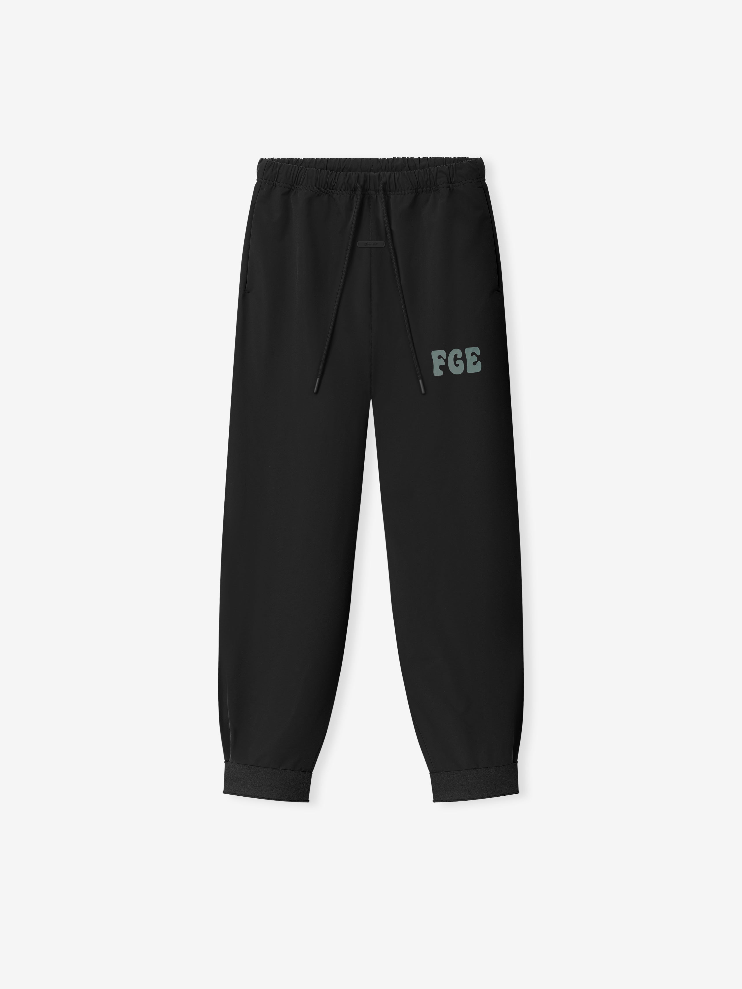 Womens Storm Pant in vintage black with elastic waistband, adjustable drawstring, cuffed ankles, and subtle gray FOG logo on the upper thigh, designed as stylish bottoms.