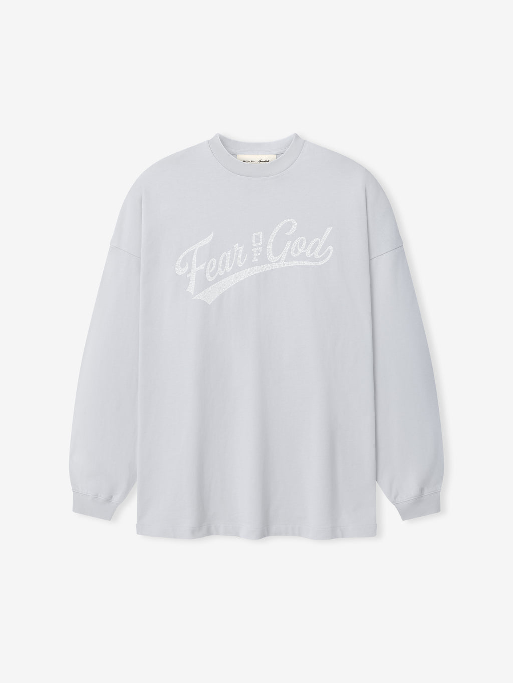 Merch Long Sleeve Tee in light grey featuring subtle tonal "Fear of God" script across the chest on a soft, relaxed fit long sleeve top.