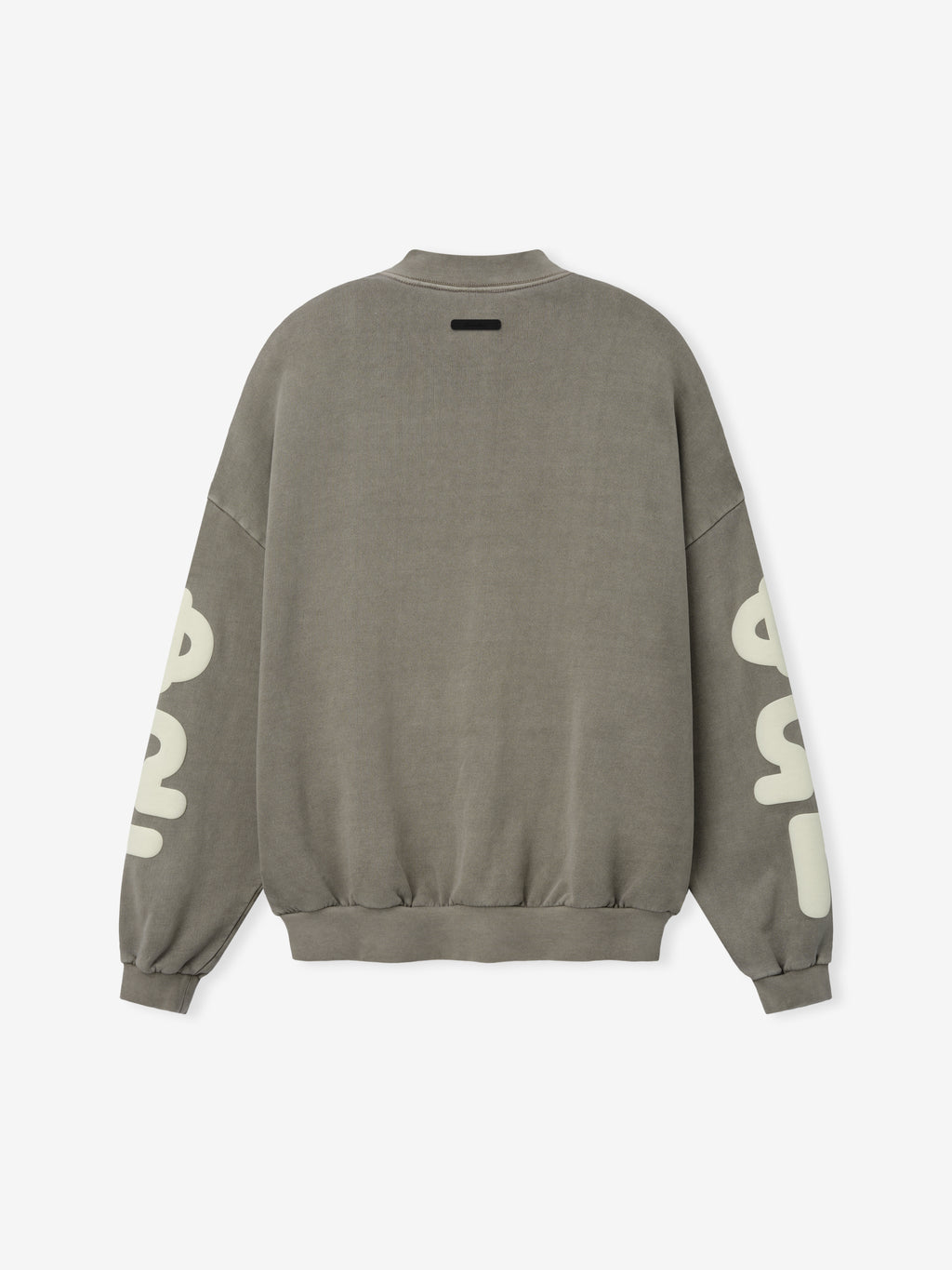 90'S Sweatshirt in a muted washed seal tone, showcasing a relaxed fit with dropped shoulders, ribbed cuffs and hem, and large contrasting lettering printed along the sleeves for casual tops.