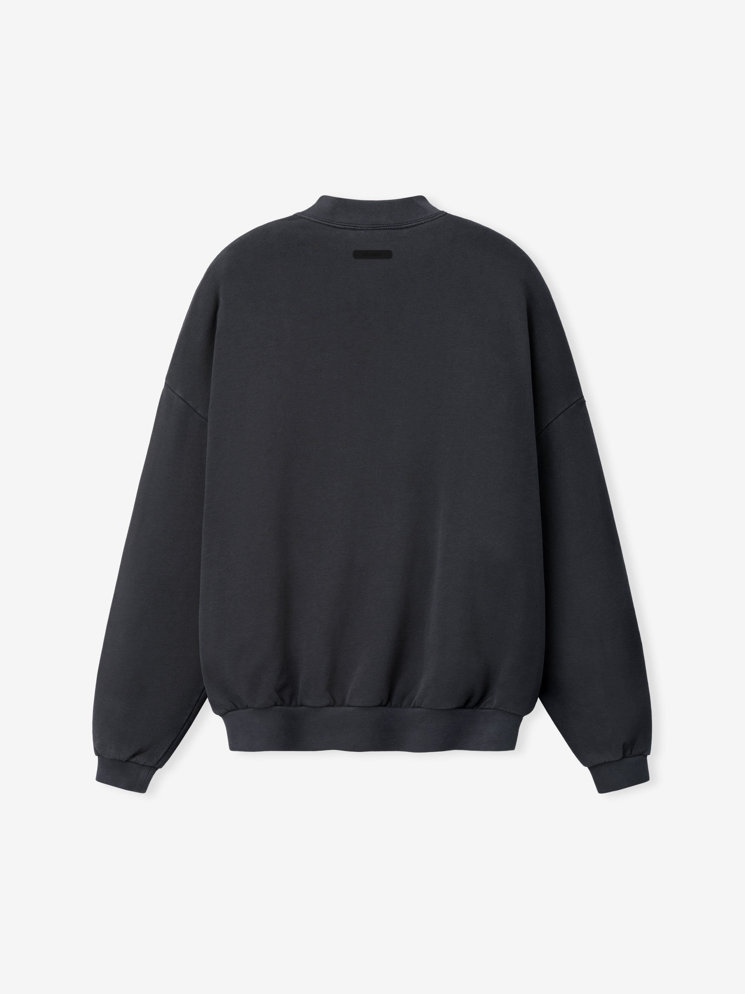90s Sweatshirt in a washed dark grey tone, featuring a minimalist design with ribbed cuffs and hem, dropped shoulders, and a relaxed fit for casual tops.