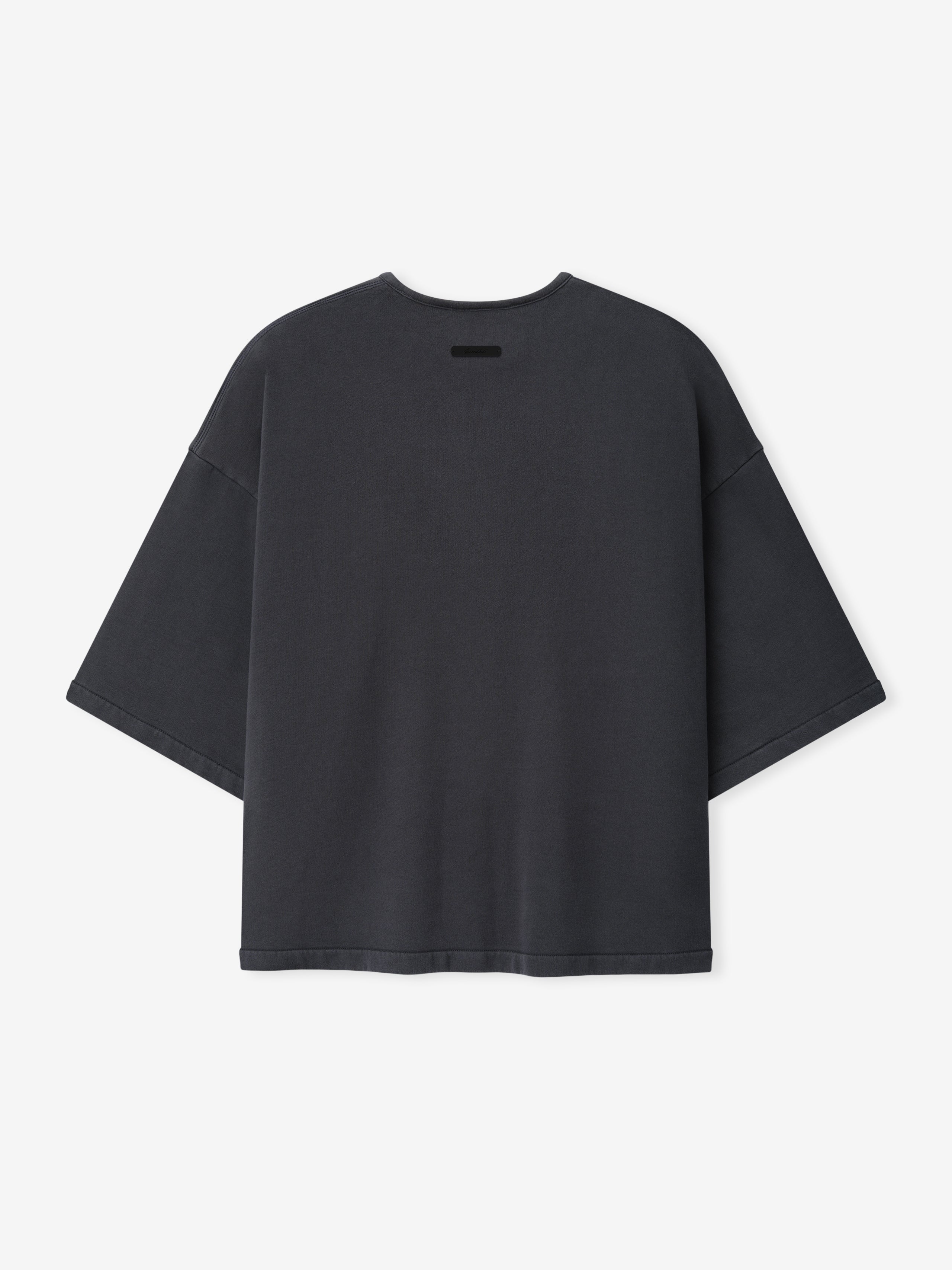 Back view of a washed iron gray 3/4 Henley Sweatshirt with wide sleeves, dropped shoulders, and a relaxed, boxy fit made from soft fabric.