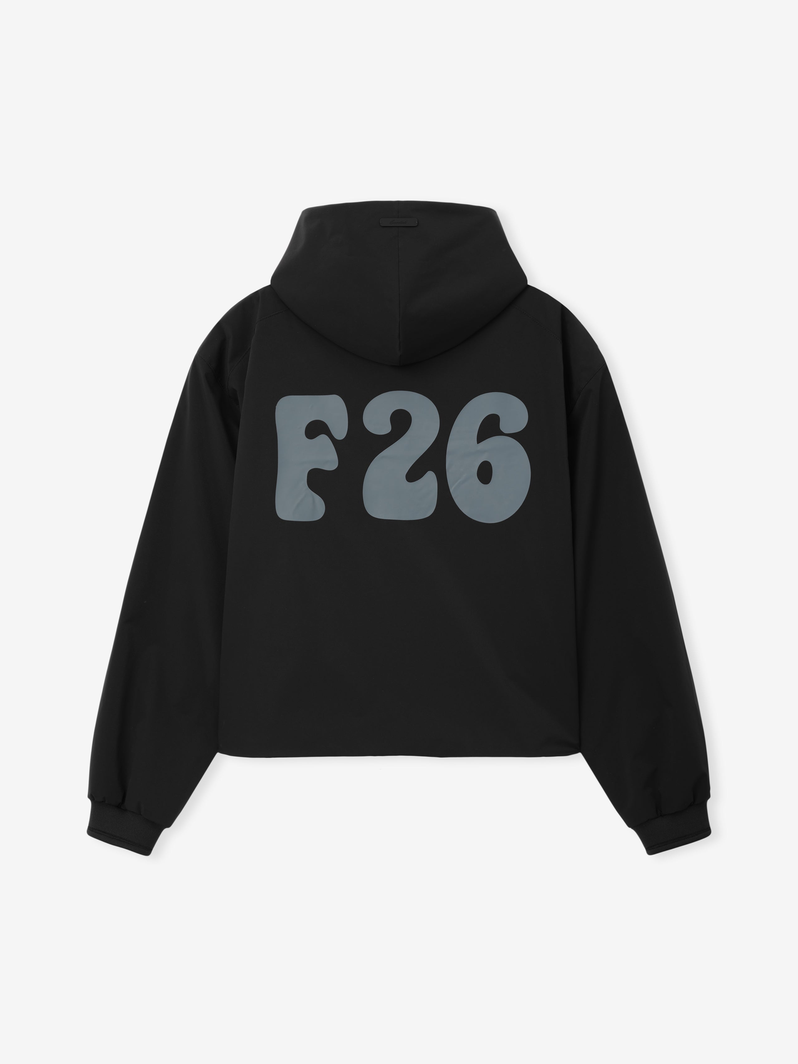 Womens Full Zip Anorak in vintage black featuring a lightweight fabric with an attached hood, elasticated cuffs, and bold graphic lettering on the back for a modern outerwear option.