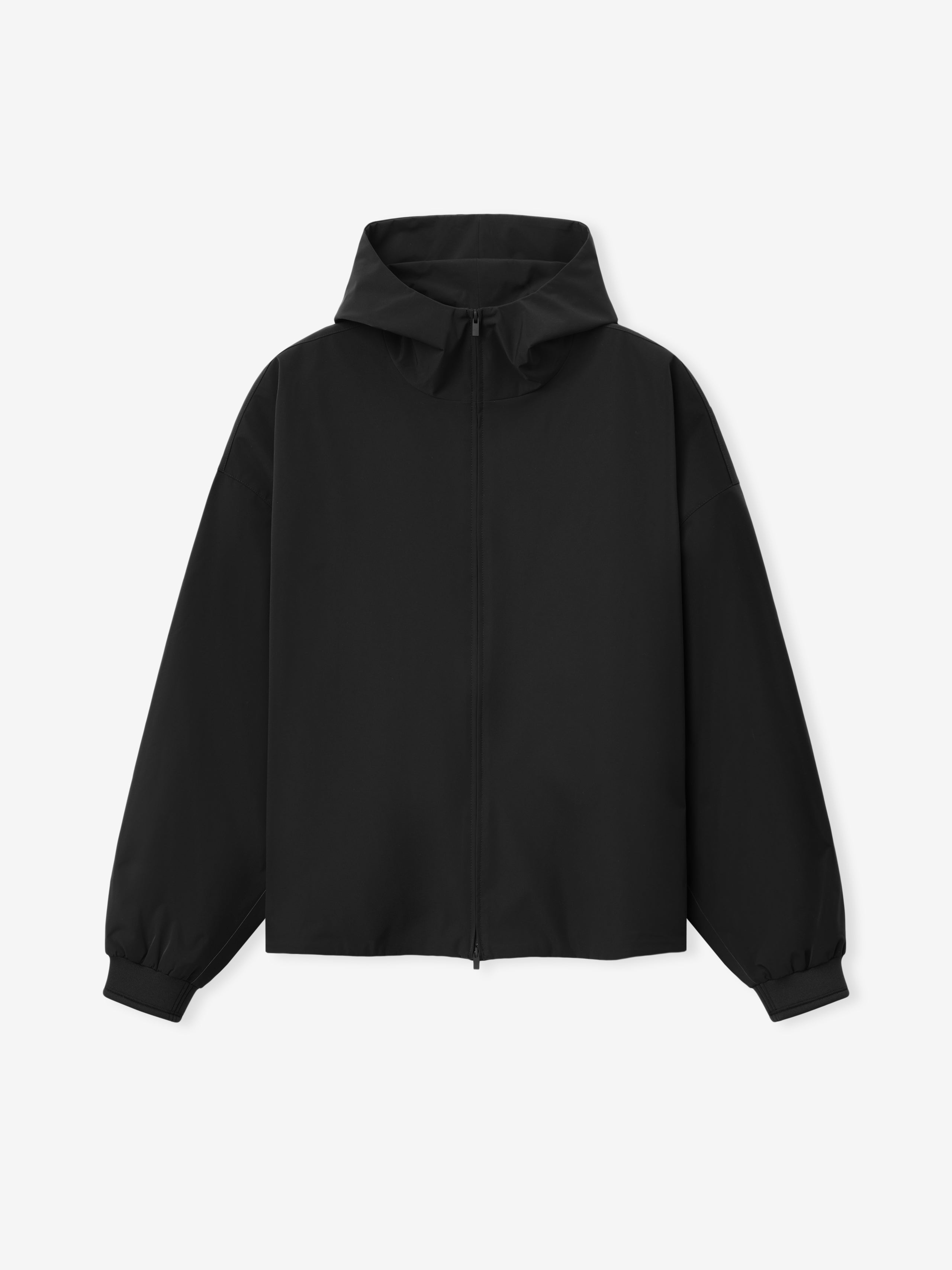 Full Zip Hooded Anorak in deep black featuring a streamlined silhouette with a front zipper, attached hood, and elastic cuffs for versatile, lightweight outerwear.