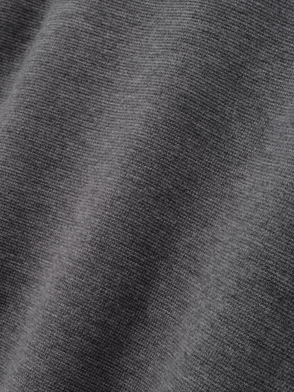 Merino Knit Mockneck Tee in gray shown in close detail with fine knit texture and a soft heathered finish as Tops