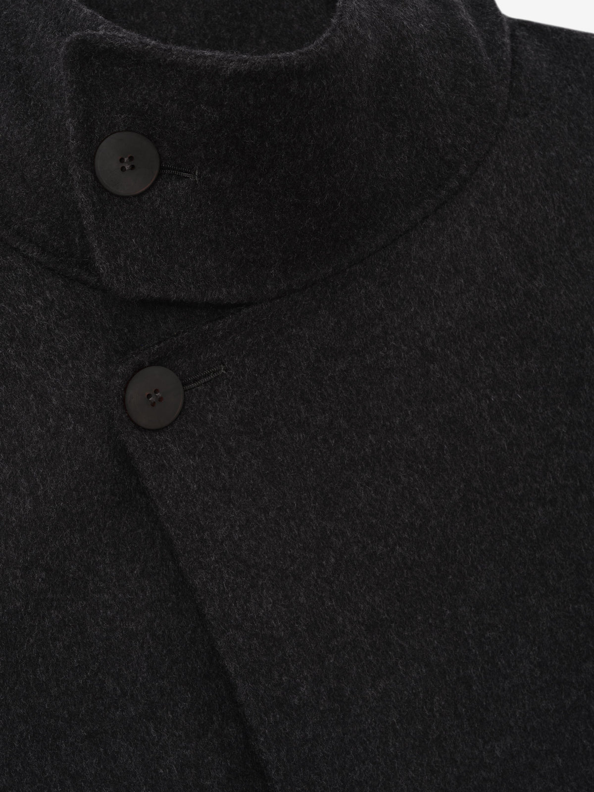 Double Face Wool Cashmere Overcoat in black shown in close detail with overlapping front panels a rounded collar and dark button fastenings as Outerwear