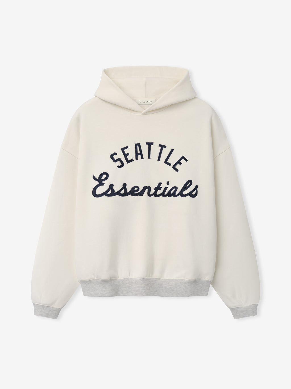 Front view of the Mariners Sport Hoodie in crema white with light heather gray ribbed cuffs and hem, featuring navy blue "Seattle Essentials" lettering across the chest.