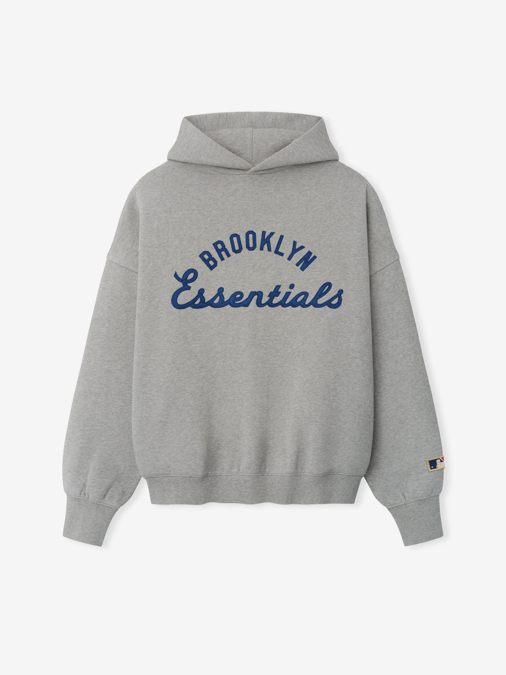 Gray hoodie with navy blue "Brooklyn Essentials" text printed on the front and a small logo patch on the sleeve cuff