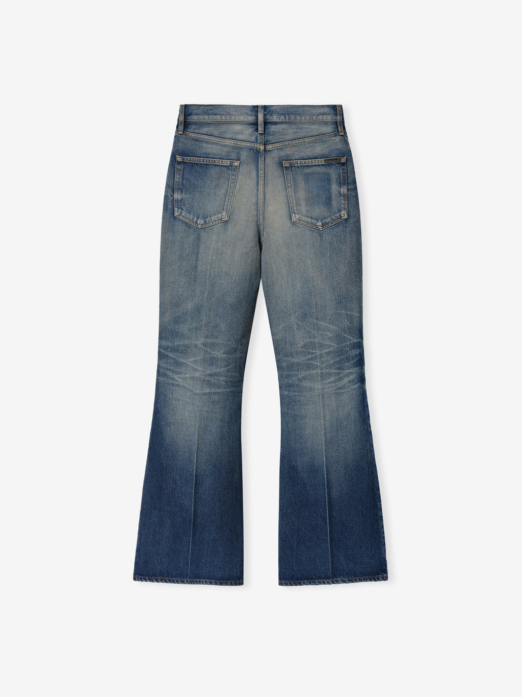 Flared Jeans in faded blue denim shown from the back with two patch pockets belt loops tonal stitching whiskering and wide flared legs as Bottoms