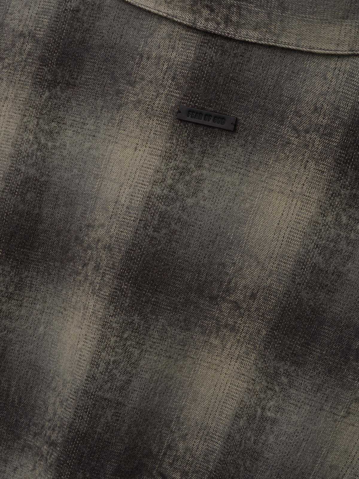 Cotton Wool Flannel Check Shirt in dark brown and gray plaid close up showing woven texture and small Fear of God label as Tops