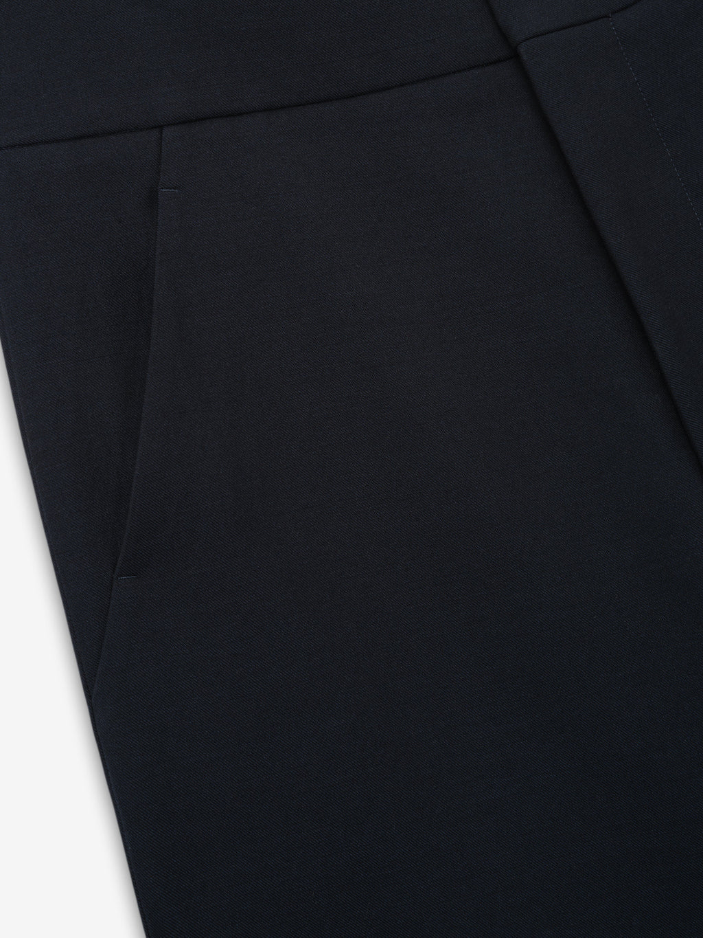 Double Weave Cotton Wool Casual Flat Front Trousers shown close up in black with a flat waistband and angled side pocket as Bottoms