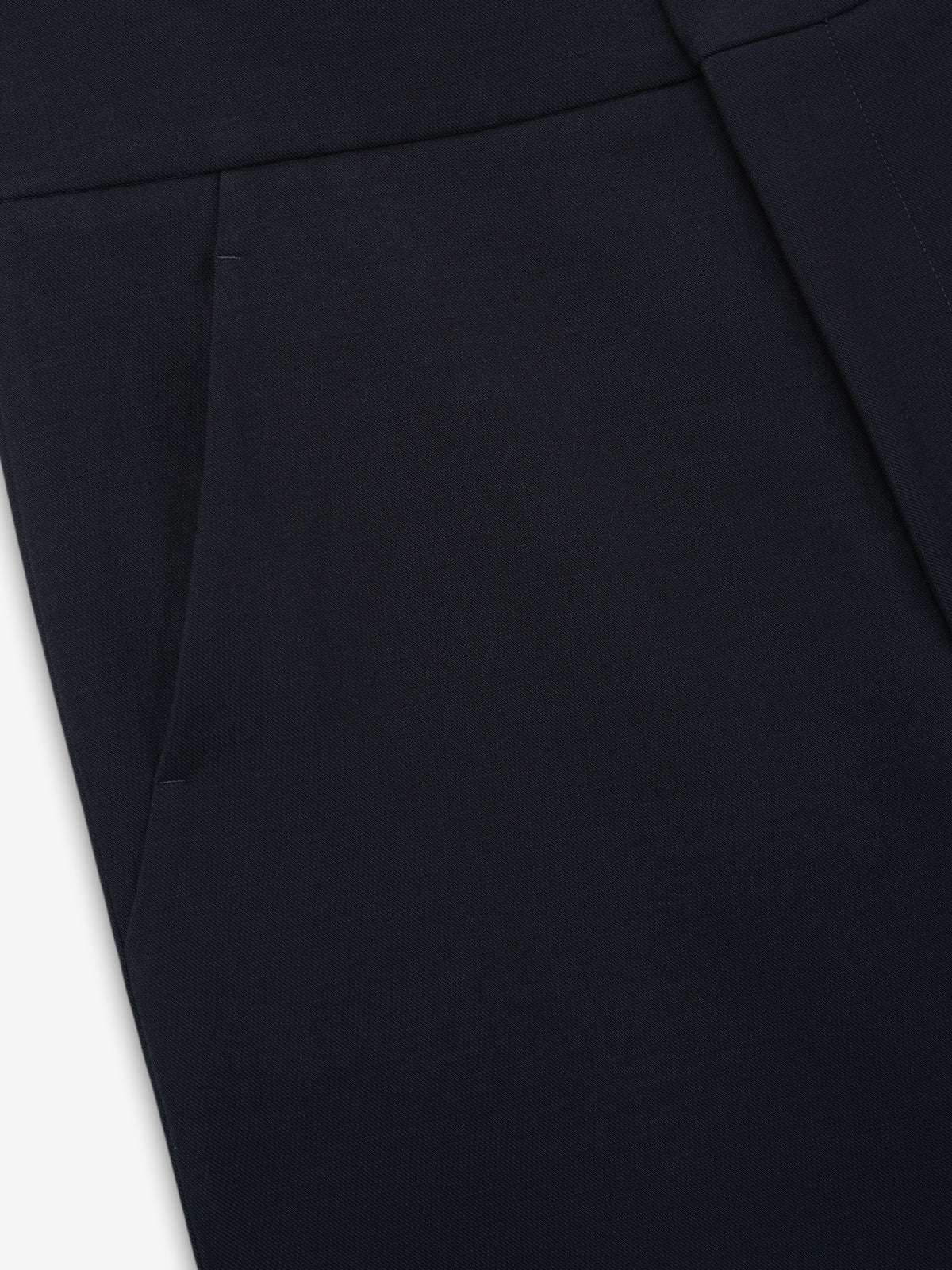 Double Weave Cotton Wool Casual Flat Front Trousers shown close up in black with a flat waistband and angled side pocket as Bottoms