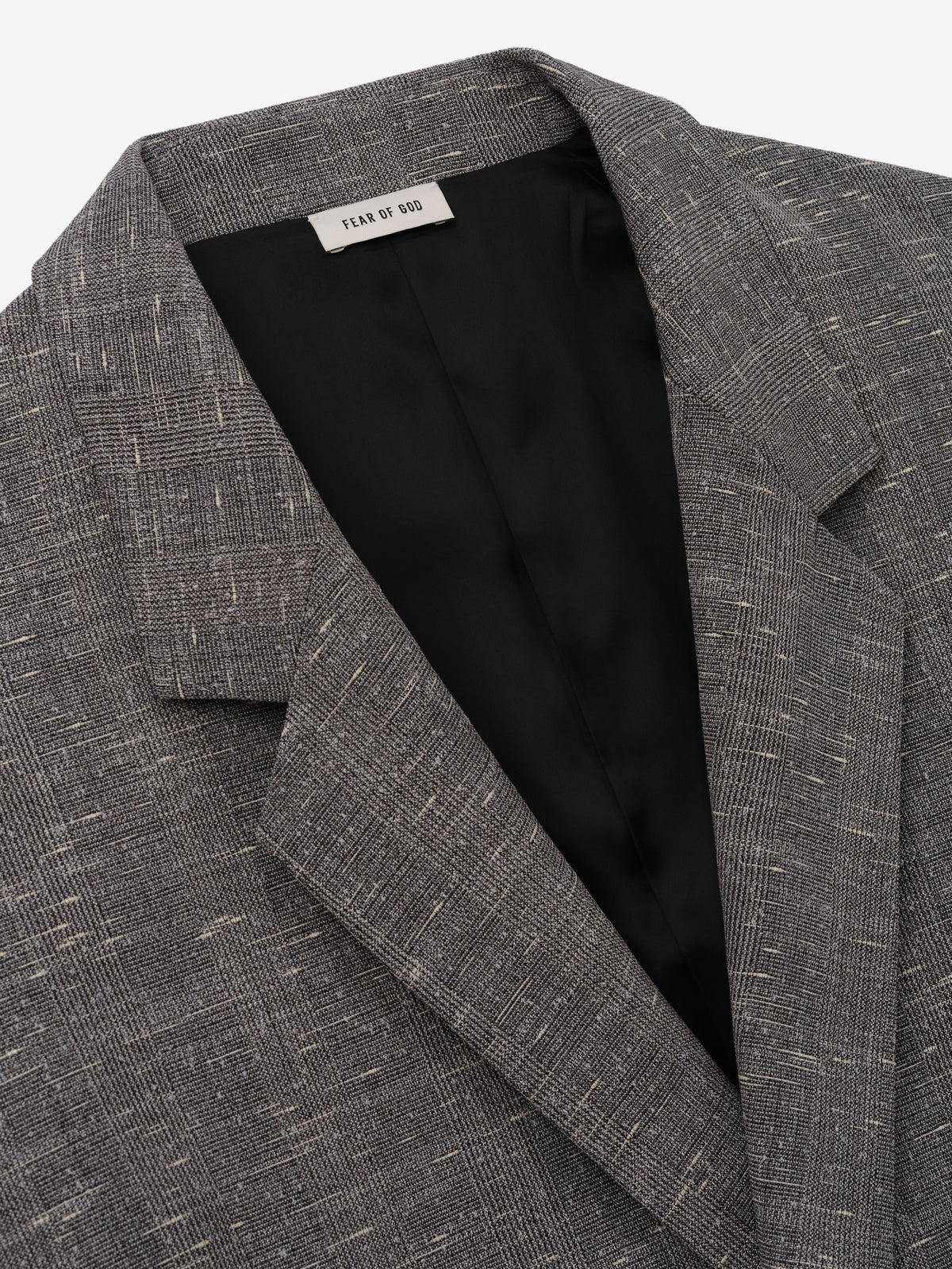 Slub Wool Cotton Relaxed Jacket close up in textured gray with notched lapels black lining and patch pocket detail as Outerwear