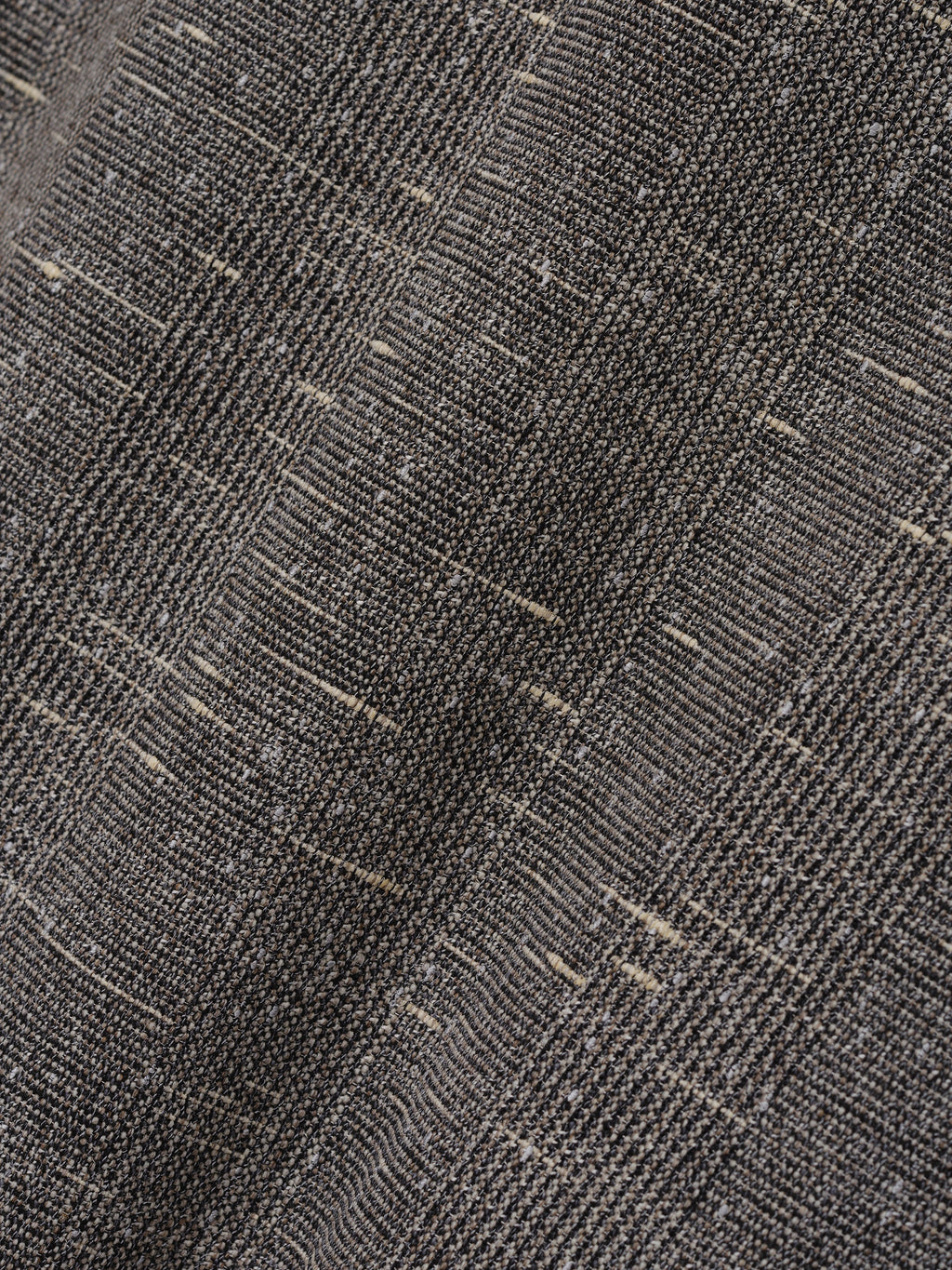 Slub Wool Cotton Relaxed Jacket close up showing dark gray textured slub weave with flecked fibers and a subtle woven pattern as Outerwear