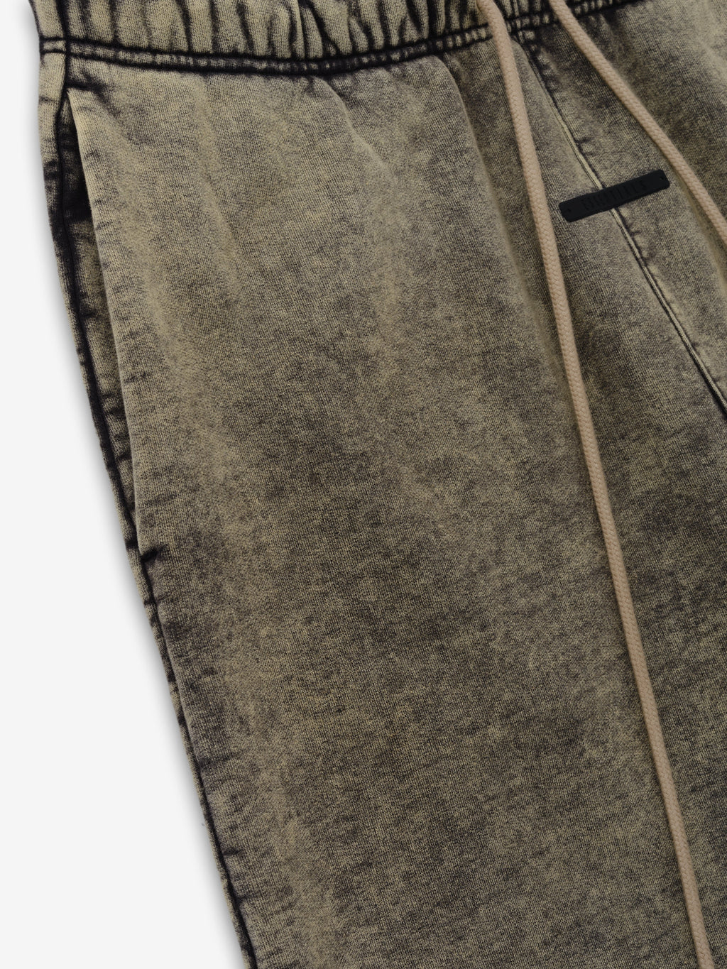 Classic Slouchy Sweatpant close up in washed olive gray showing textured fleece fabric an elastic waistband long drawcord and side pocket detail