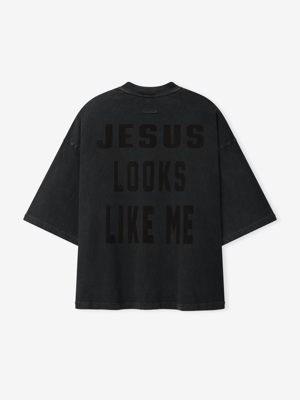 Cross Tee shown flat from the front in black with a crew neck short sleeves relaxed fit and tonal JESUS LOOKS LIKE ME graphic as Tops