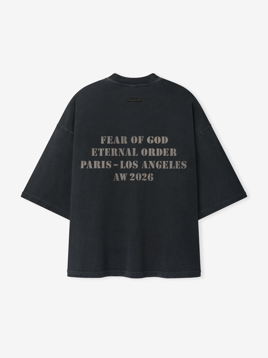 AW26 Tee in black with short sleeves and front Fear of God Eternal Order Paris Los Angeles AW 2026 lettering shown flat as Tops