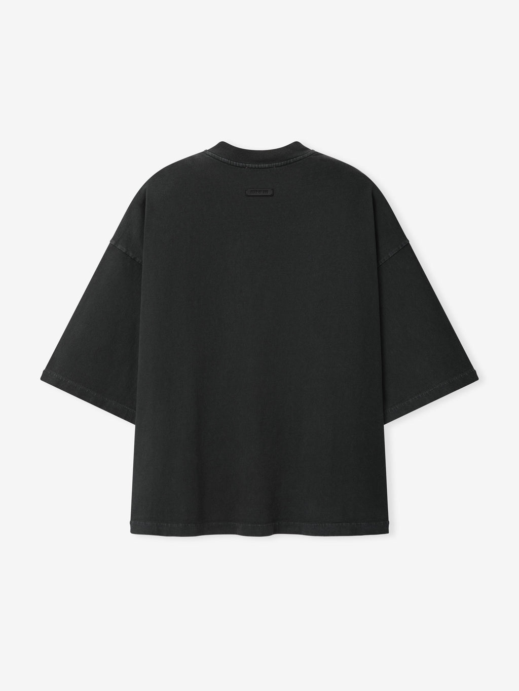 Eternal Tee in black with a clean front and subtle tonal chest logo shown flat with short sleeves as Tops