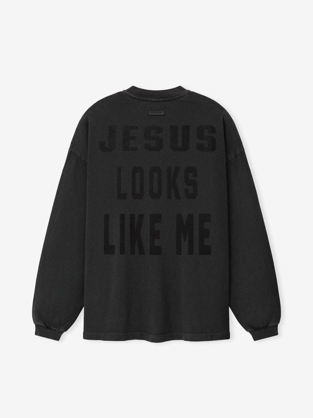 Cross Long Sleeve Tee in black with tonal JESUS LOOKS LIKE ME lettering across the front and ribbed cuffs shown flat as Tops
