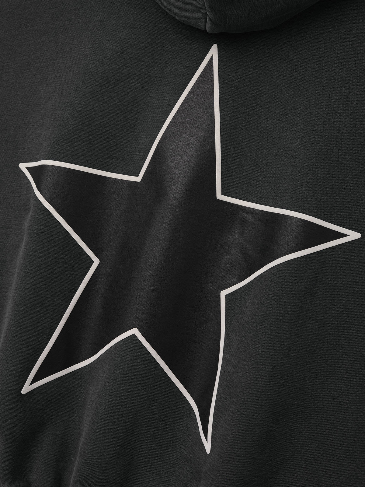 Reflection Eternal Hoodie in black shown in close detail with a large outlined star graphic across the back and soft hooded design as Tops