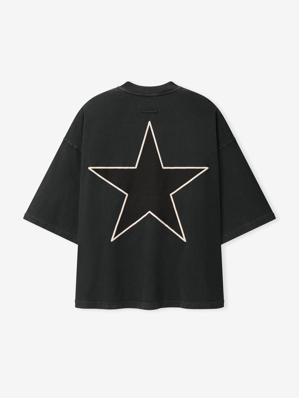 Reflection Eternal Tee in black with a large cream outlined star graphic across the front and short sleeves shown flat as Tops