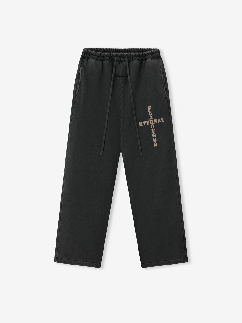 Cross Wide Leg Sweatpants in black with an elastic waistband drawcords wide straight legs and vertical Fear of God Eternal branding displayed flat as Bottoms