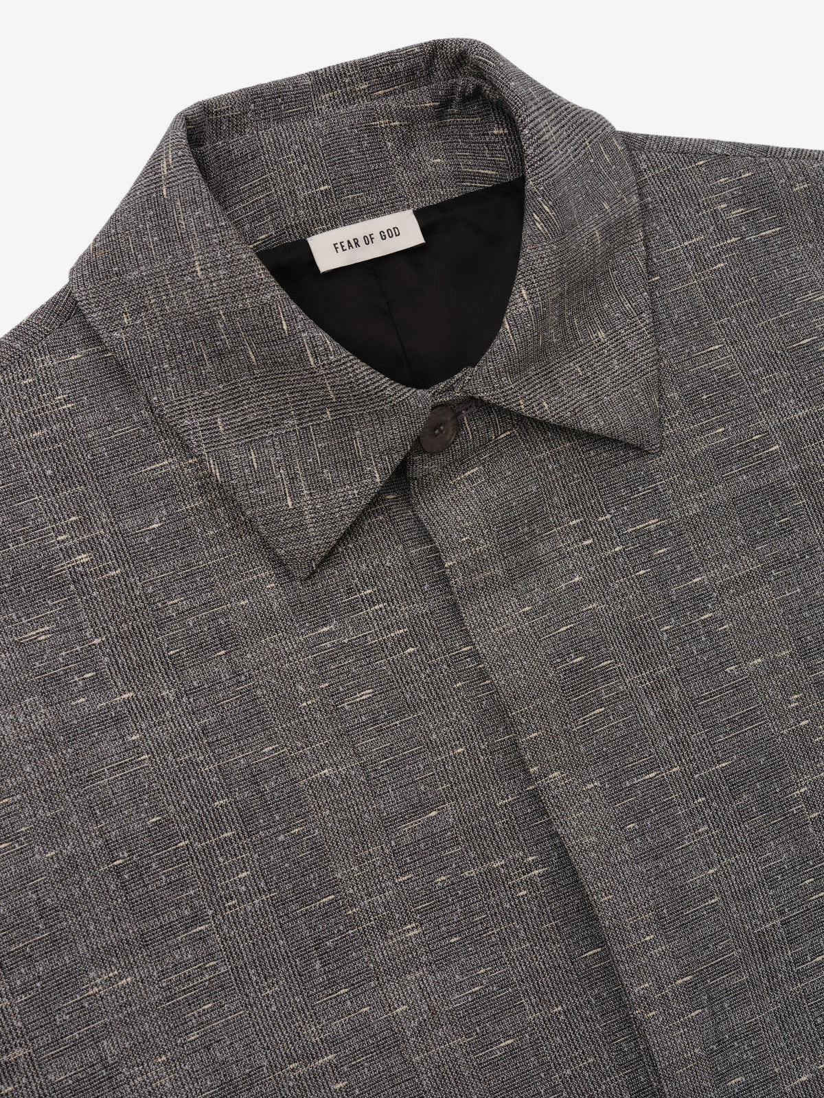 Slub Wool Cotton Casual Trench Coat in gray closeup showing pointed collar button closure textured weave and Fear of God neck label as Outerwear