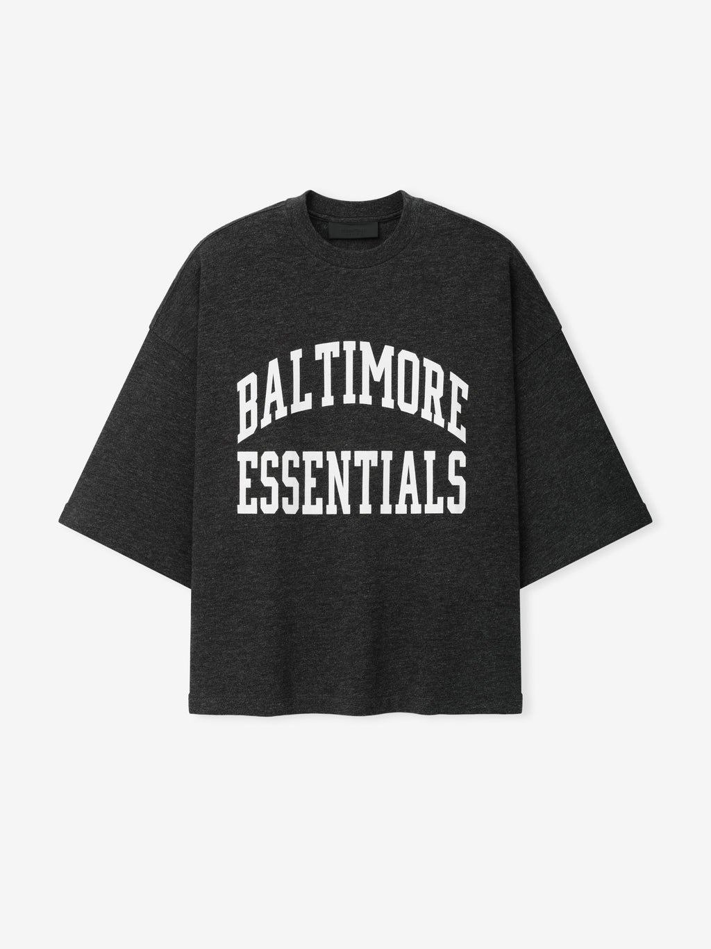Ravens Merch Tee dark charcoal oversized shirt with bold white Baltimore Essentials collegiate lettering displayed against a light background in a clean Tops product view