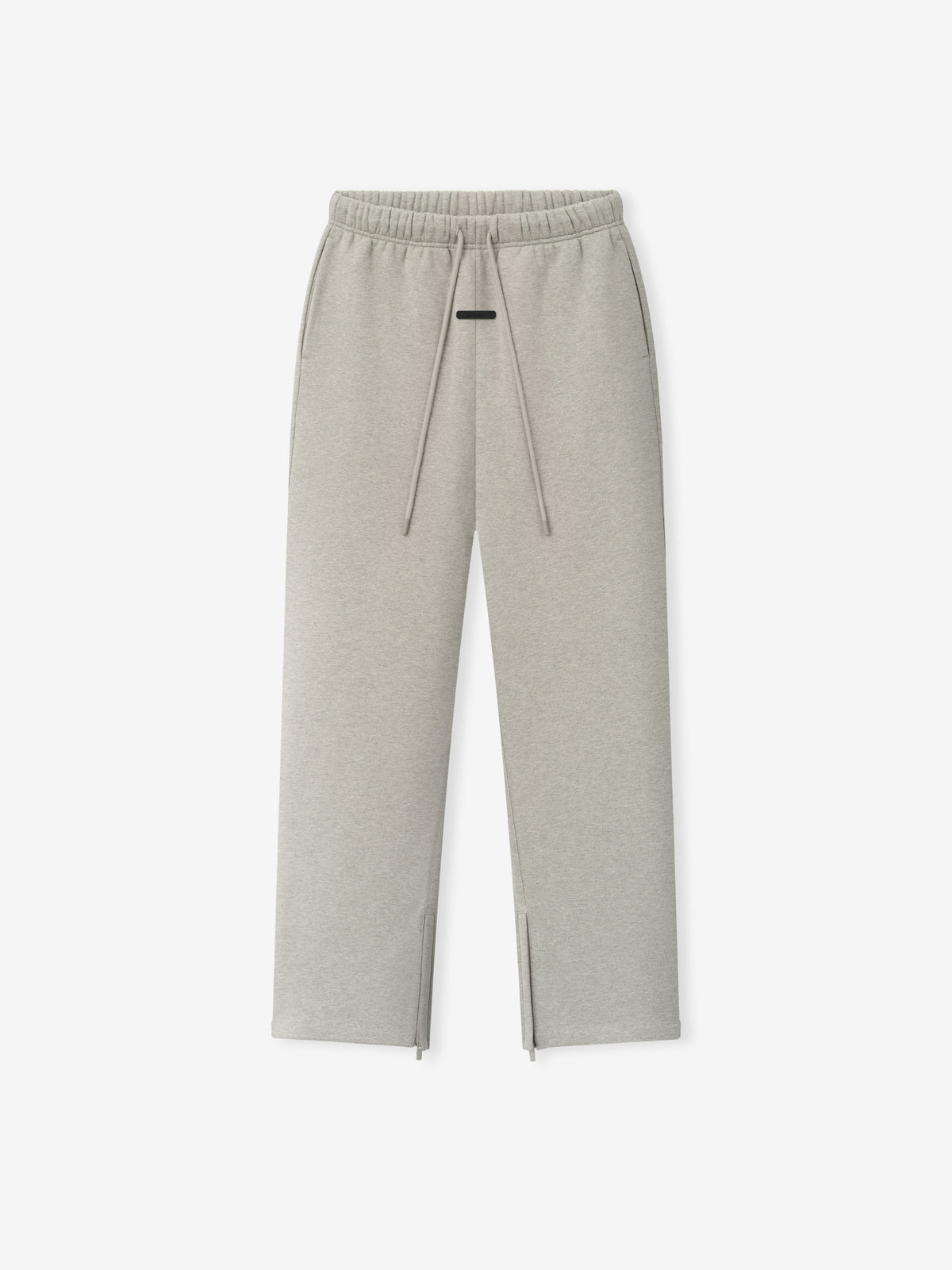 Essentials FW26 Classic Trackpant in light gray with an elastic waistband drawstrings zip hems and straight legs displayed against a white background