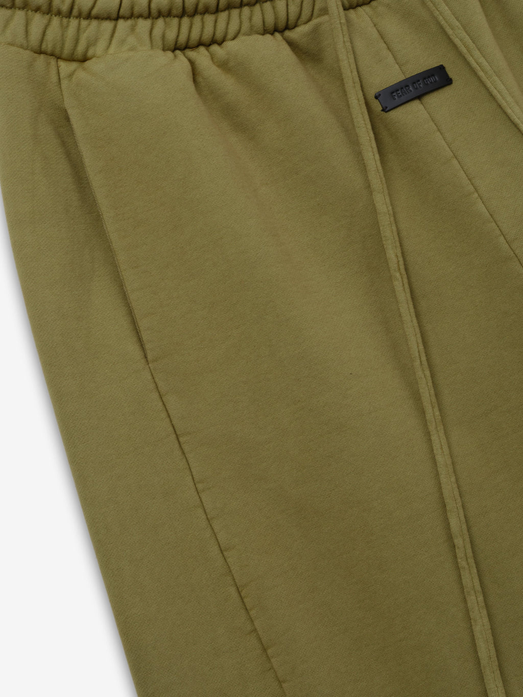 Engineered Sweatpants in olive green closeup showing elastic waistband stitched seam and branded label detail as Bottoms