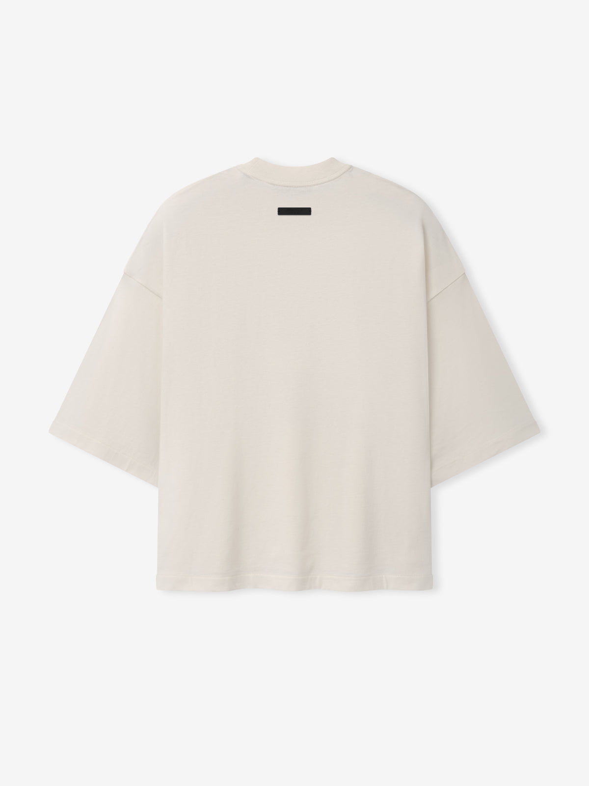 NFL Paris Merch Tee in off white with short sleeves and relaxed fit shown from the back against a plain background Tops