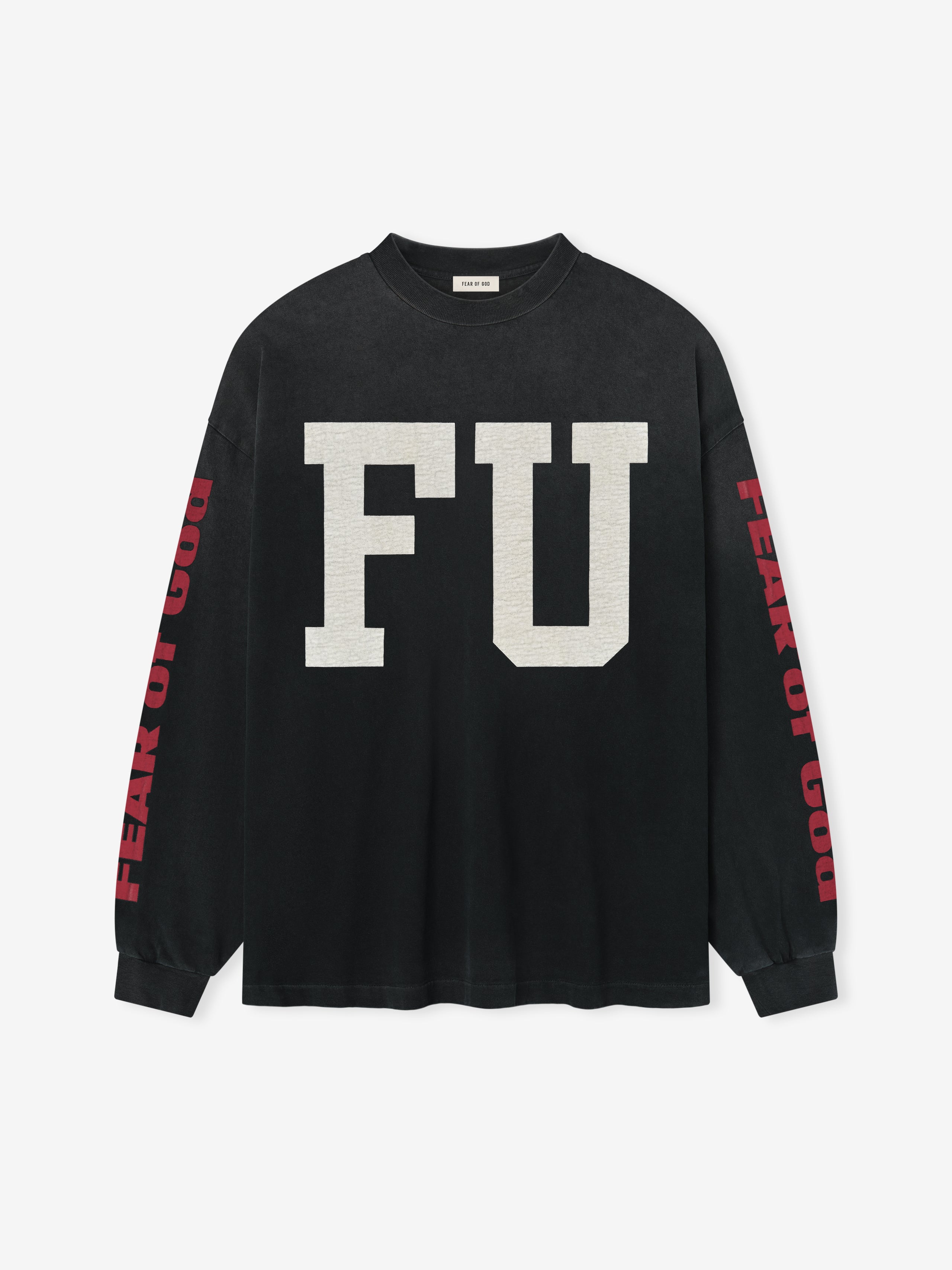 Freedom Relaxed Long Sleeve Tee in black featuring large collegiate-style “FU” lettering on the front and red “Fear of God” text along the sleeves, crafted from soft cotton for a casual tops look.