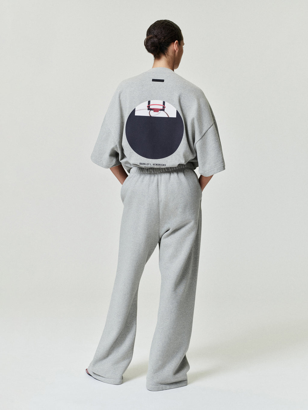 light grey oversized heavy cotton jersey tee with circular basketball hoop graphic and Barkley Hendricks text on back