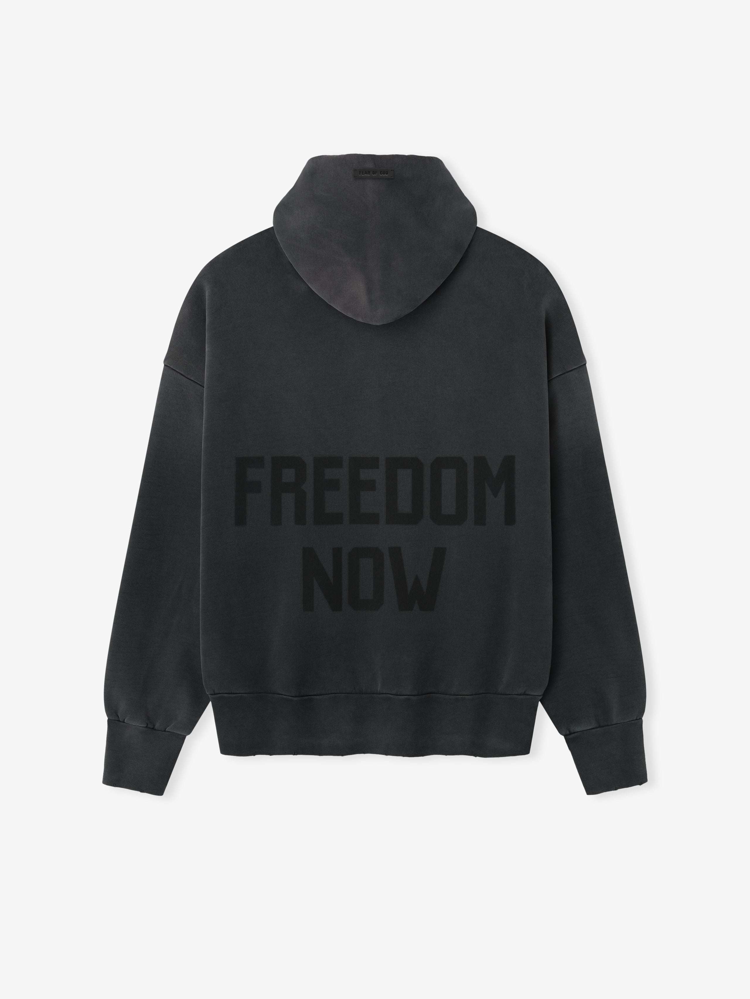 Vintage Power 25 Hoodie in washed black featuring large tonal "FREEDOM NOW" text on the back, designed with a relaxed fit, ribbed cuffs, and cozy hooded outerwear style.