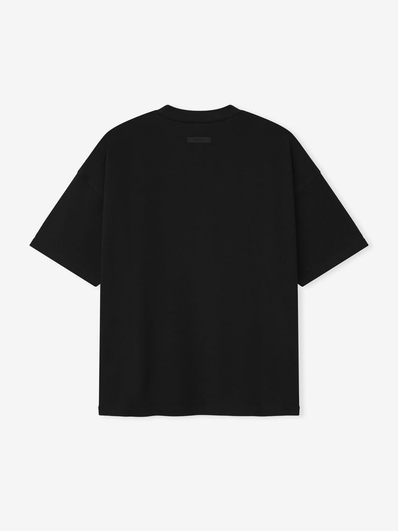Back view of black Ponte 90s Tee showing minimalist design with small label near neckline, gallery image dtuv0JAw.jpg