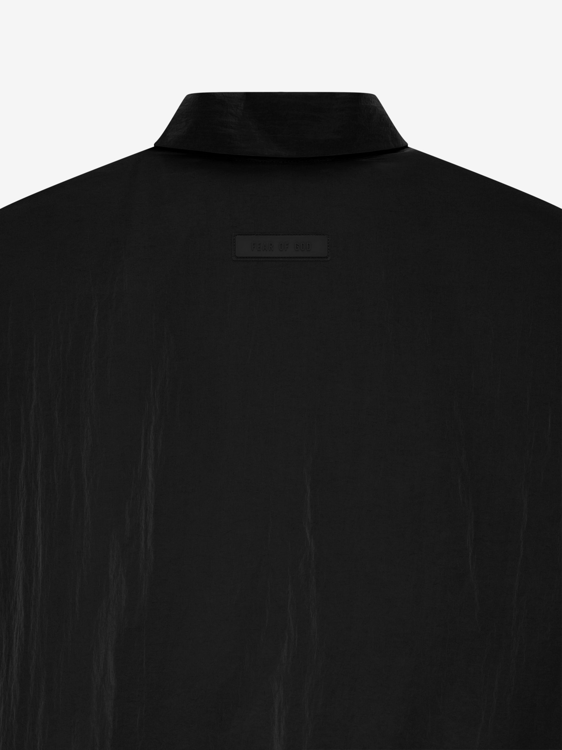 ESSENTIALS Womens Shell Bomber in Jet Black | Fear of God